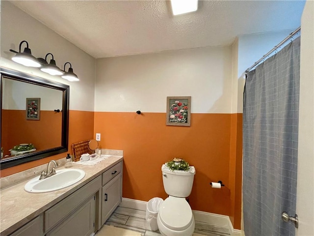 900 Dogwood St, Huntsville, AR 72740 - full bathroom with vanity, a shower with shower curtain, and a textured ceiling