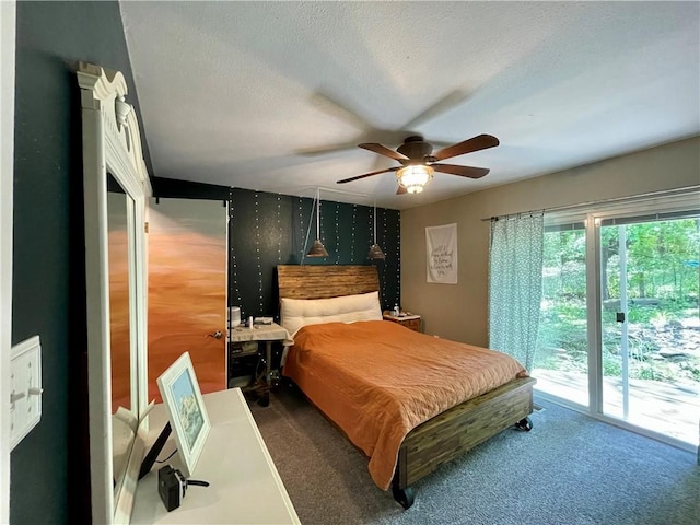 900 Dogwood St, Huntsville, AR 72740 - carpeted bedroom featuring access to exterior, a textured ceiling, and ceiling fan
