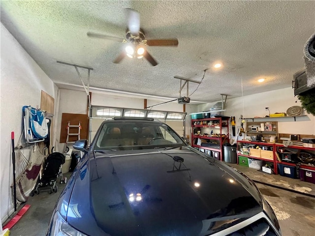900 Dogwood St, Huntsville, AR 72740 - garage with a ceiling fan and a garage door opener