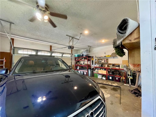 900 Dogwood St, Huntsville, AR 72740 - garage with a garage door opener and ceiling fan