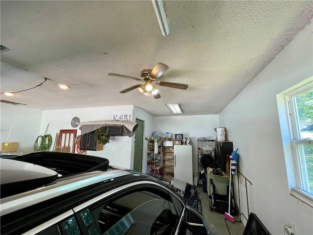 900 Dogwood St, Huntsville, AR 72740 - garage featuring a ceiling fan