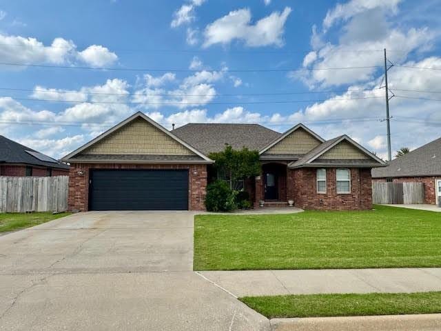 108 Hoss St, Centerton, AR 72719 - craftsman house with concrete driveway, an attached garage, and brick siding