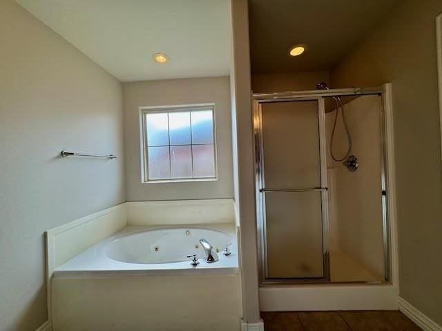 108 Hoss St, Centerton, AR 72719 - full bathroom featuring a shower stall, a tub with jets, tile patterned flooring, and baseboards