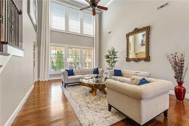 5304 S Promontory Ct, Rogers, AR 72758 - living area with a high ceiling, ceiling fan, and wood finished floors