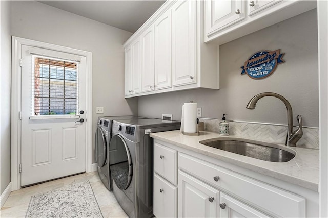 5304 S Promontory Ct, Rogers, AR 72758 - washroom with cabinet space and washer and clothes dryer