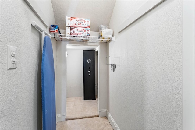 5304 S Promontory Ct, Rogers, AR 72758 - hall with carpet and a textured wall