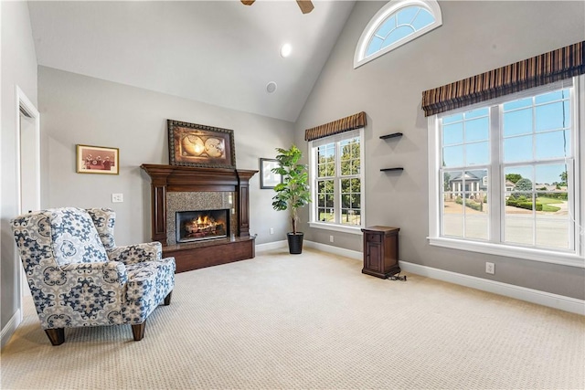 5304 S Promontory Ct, Rogers, AR 72758 - living area featuring carpet floors, a ceiling fan, high vaulted ceiling, and a fireplace