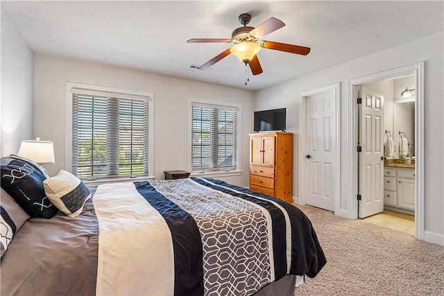 5304 S Promontory Ct, Rogers, AR 72758 - carpeted bedroom with ensuite bath and ceiling fan
