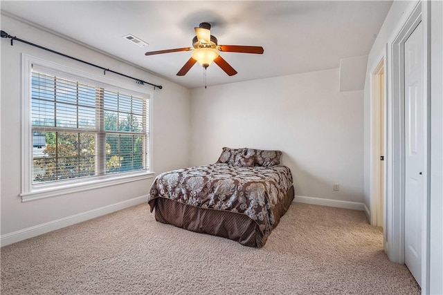 5304 S Promontory Ct, Rogers, AR 72758 - carpeted bedroom with baseboards and a ceiling fan