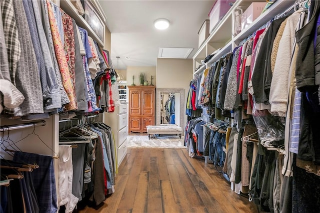 5500 SW Gunstock Rd, Bentonville, AR 72713 - spacious closet with attic access and wood-type flooring