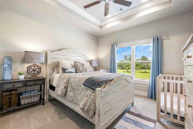 5500 SW Gunstock Rd, Bentonville, AR 72713 - bedroom with carpet flooring, crown molding, a raised ceiling, and ceiling fan