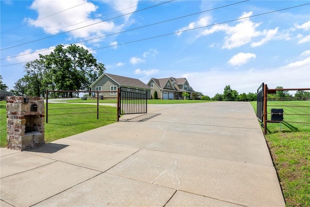 5500 SW Gunstock Rd, Bentonville, AR 72713 - view of concrete surface with a gated entry and a gate