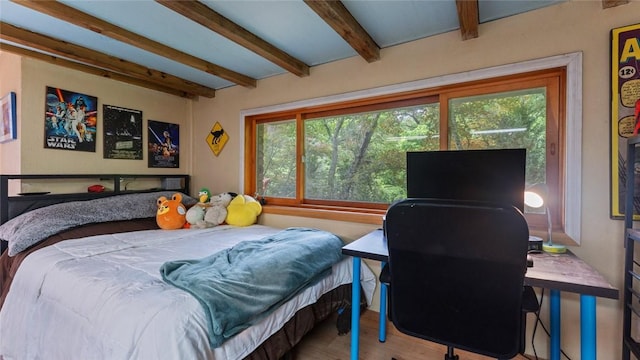 5 Alexander St, Eureka Springs, AR 72632 - bedroom with beam ceiling, wood finished floors, and a desk