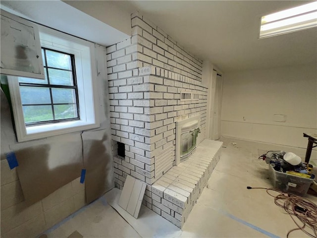 321 F Hwy, Anderson, MO 64831 - bathroom featuring a fireplace