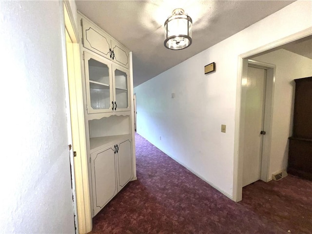 321 F Hwy, Anderson, MO 64831 - corridor with dark colored carpet
