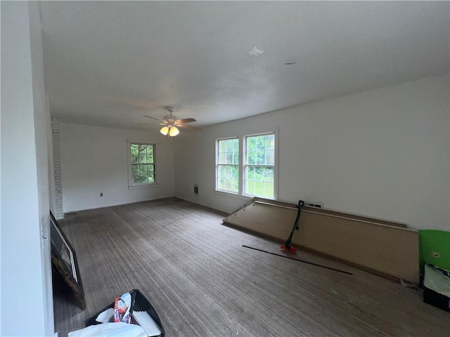 321 F Hwy, Anderson, MO 64831 - carpeted empty room featuring a ceiling fan