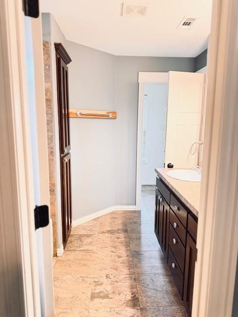 1117 Nemett Dr, Pea Ridge, AR 72751 - bathroom featuring vanity and baseboards