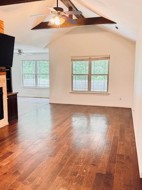 1117 Nemett Dr, Pea Ridge, AR 72751 - unfurnished living room featuring ceiling fan, a fireplace, baseboards, and wood finished floors