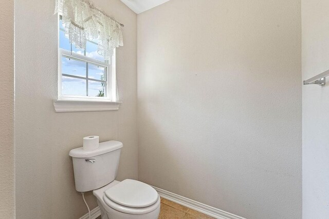 625 Eagle Crst, Pea Ridge, AR 72751 - bathroom featuring toilet, baseboards, and tile patterned flooring
