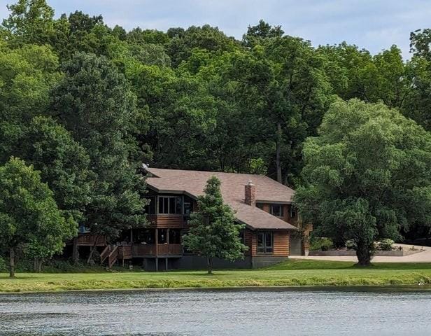 11328 Jolly Mill Ln, Pierce City, MO 65723 - view of front of house featuring a water view, a front lawn, and a forest view