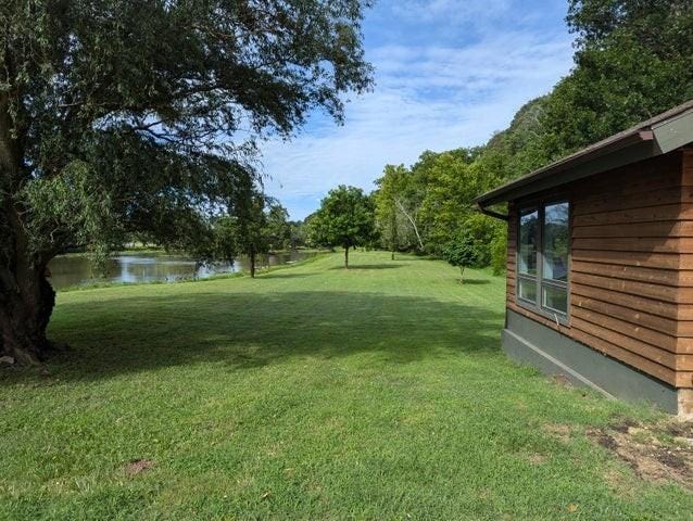 11328 Jolly Mill Ln, Pierce City, MO 65723 - view of green lawn with a water view