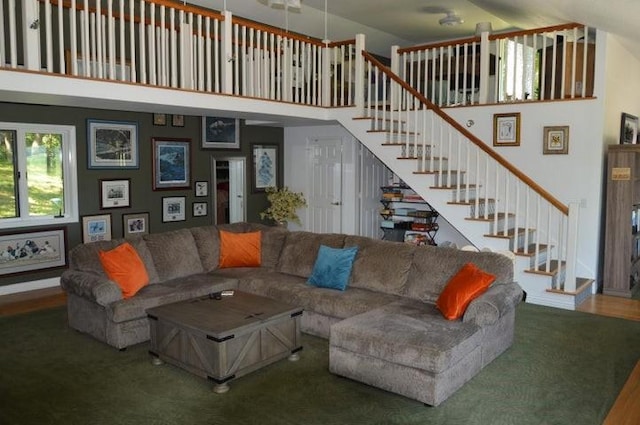 11328 Jolly Mill Ln, Pierce City, MO 65723 - living area with a high ceiling, stairs, and wood finished floors