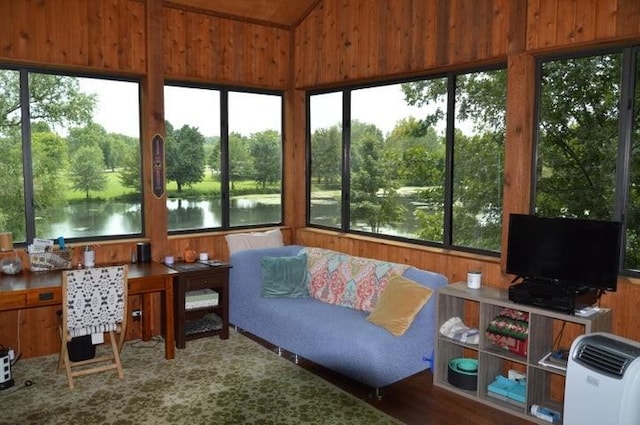 11328 Jolly Mill Ln, Pierce City, MO 65723 - sunroom featuring plenty of natural light, vaulted ceiling, and view of wooded area