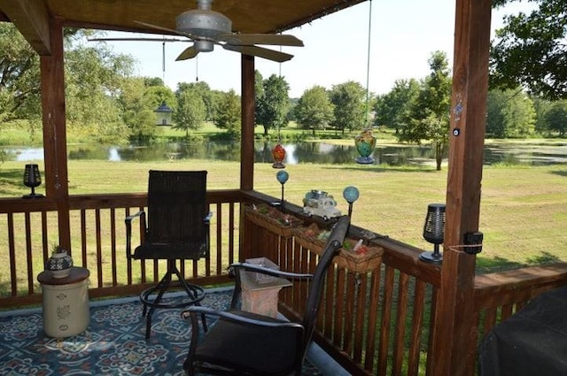 11328 Jolly Mill Ln, Pierce City, MO 65723 - wooden terrace with a water view, ceiling fan, a lawn, and view of wooded area