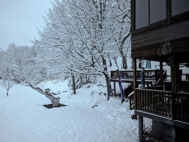 11328 Jolly Mill Ln, Pierce City, MO 65723 - yard layered in snow featuring a wooden deck