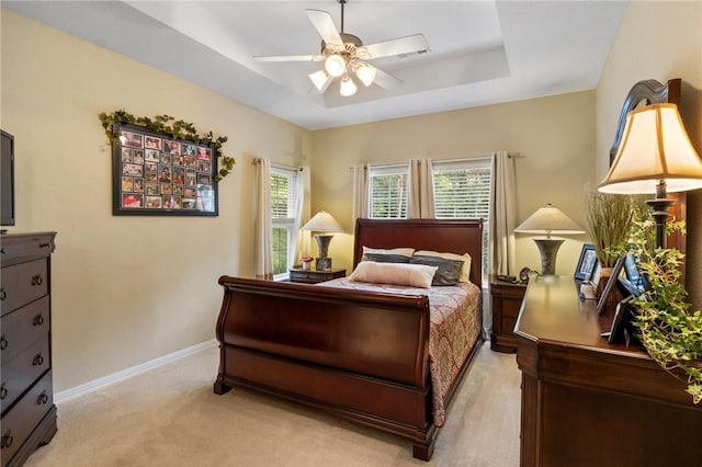 2 Moniave Ln, Bella Vista, AR 72715 - bedroom featuring a tray ceiling, baseboards, light colored carpet, and ceiling fan