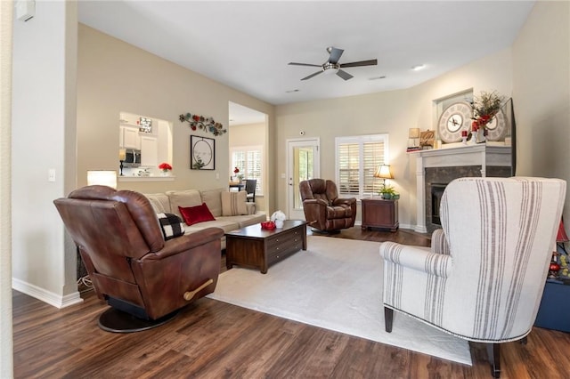 2 Moniave Ln, Bella Vista, AR 72715 - living area with ceiling fan, dark wood-style flooring, and a fireplace