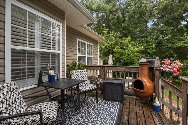 2 Moniave Ln, Bella Vista, AR 72715 - deck with outdoor dining area