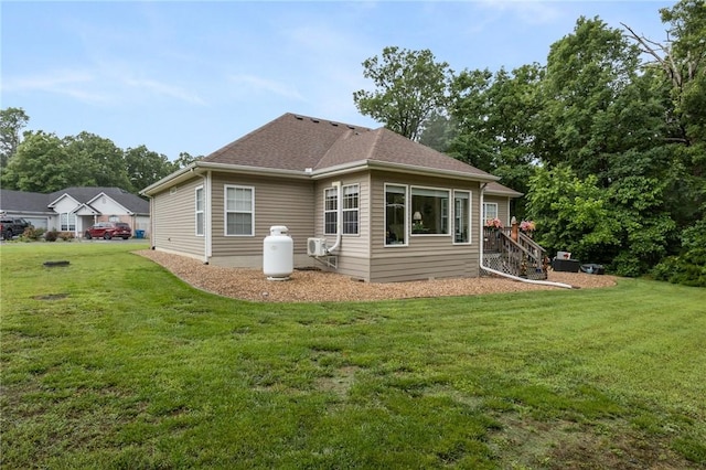 2 Moniave Ln, Bella Vista, AR 72715 - back of house with a yard and stairway