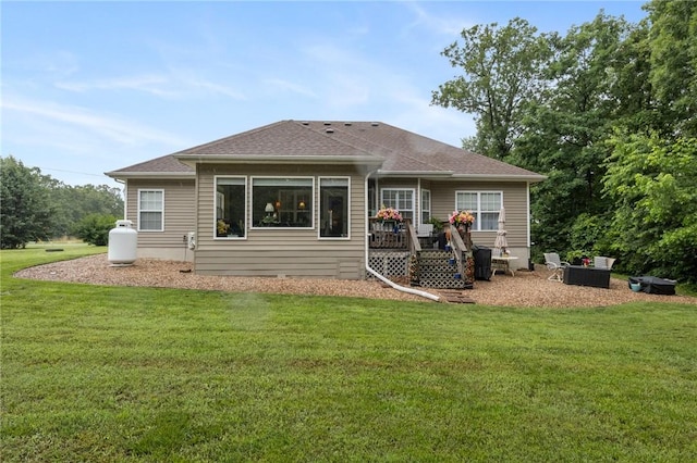 2 Moniave Ln, Bella Vista, AR 72715 - rear view of house with a lawn, a deck, and a shingled roof