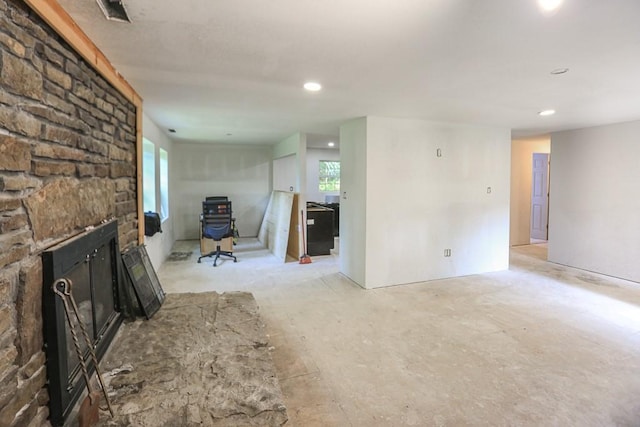 1732 Madison Unit 4316, Elkins, AR 72727 - unfurnished living room with a fireplace, plenty of natural light, and recessed lighting