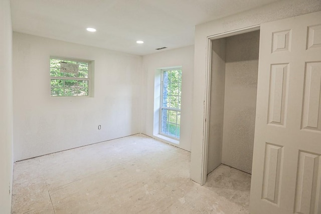 1732 Madison Unit 4316, Elkins, AR 72727 - unfurnished bedroom with recessed lighting
