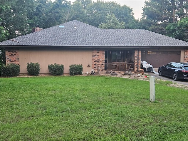 9 Forfar Ln, Bella Vista, AR 72715 - view of front of home with roof with shingles, a chimney, an attached garage, a front yard, and brick siding