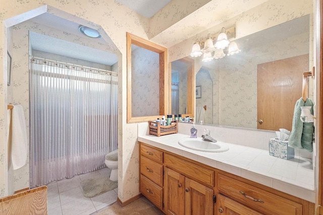 11 Yarmouth Dr, Bella Vista, AR 72715 - full bathroom featuring wallpapered walls, vanity, toilet, tile patterned flooring, and shower / bath combo with shower curtain