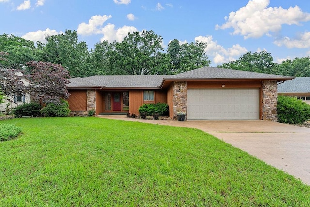 11 Yarmouth Dr, Bella Vista, AR 72715 - view of front of property with stone siding, an attached garage, a front yard, and driveway
