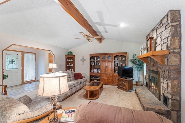 11 Yarmouth Dr, Bella Vista, AR 72715 - living area with a ceiling fan, a fireplace, and a textured ceiling