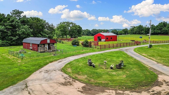 12976 Hummingbird Rd, Elkins, AR 72727 - surrounding community featuring an outdoor structure, curved driveway, a view of rural / pastoral area, and an outbuilding