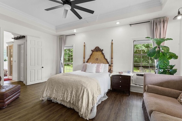 12976 Hummingbird Rd, Elkins, AR 72727 - bedroom featuring a raised ceiling, crown molding, dark wood-style flooring, multiple windows, and recessed lighting