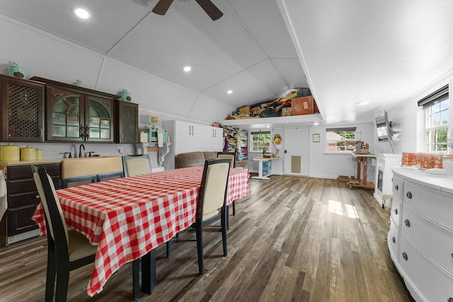 12976 Hummingbird Rd, Elkins, AR 72727 - dining space featuring wood finished floors, vaulted ceiling, and ceiling fan