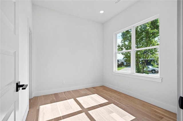 1421 Lee St, Pea Ridge, AR 72751 - spare room with plenty of natural light, wood finished floors, and recessed lighting