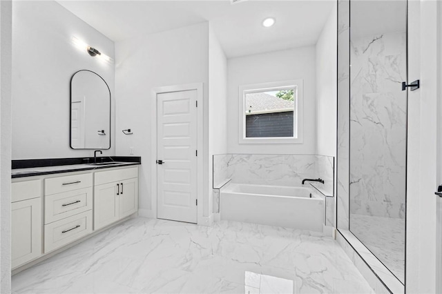 1421 Lee St, Pea Ridge, AR 72751 - bathroom featuring a garden tub, vanity, marble finish flooring, and a marble finish shower