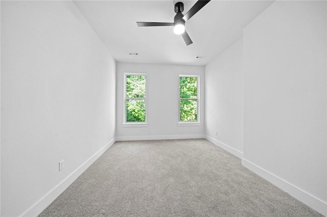 1421 Lee St, Pea Ridge, AR 72751 - carpeted empty room with a ceiling fan and baseboards