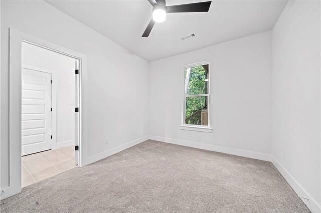 1421 Lee St, Pea Ridge, AR 72751 - carpeted empty room featuring ceiling fan and baseboards