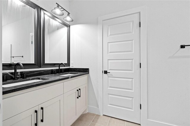 1421 Lee St, Pea Ridge, AR 72751 - full bathroom with double vanity and tile patterned flooring