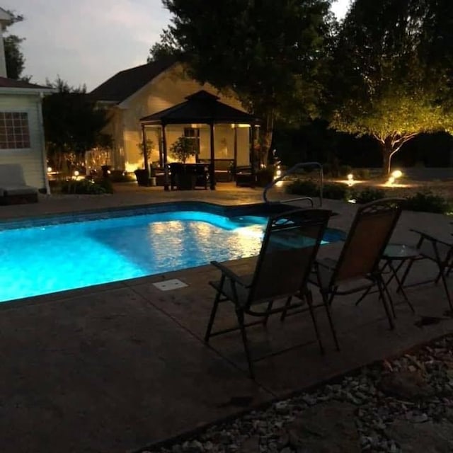 19537 Eastfork Ln, Gravette, AR 72736 - swimming pool featuring a gazebo and a patio