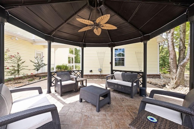 19537 Eastfork Ln, Gravette, AR 72736 - view of patio / terrace featuring an outdoor hangout area, a gazebo, and a ceiling fan